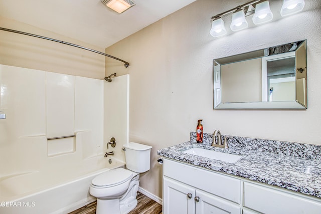 full bathroom with toilet, shower / bath combination, hardwood / wood-style flooring, and vanity