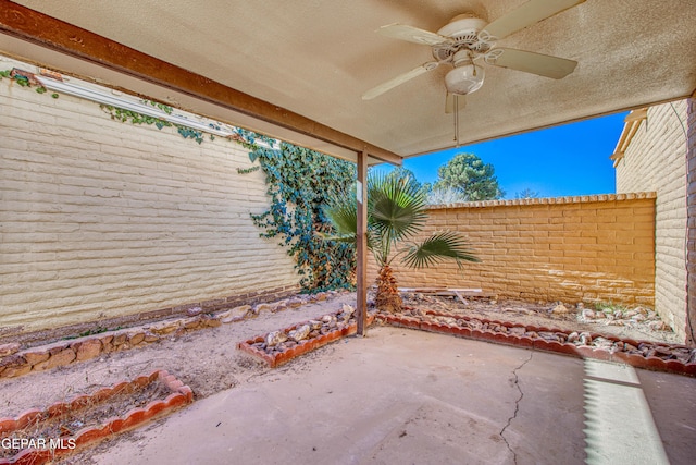 view of patio / terrace featuring ceiling fan