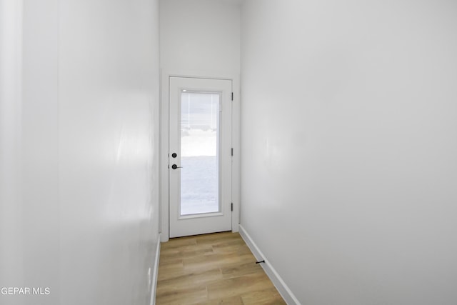 doorway to outside featuring light hardwood / wood-style floors