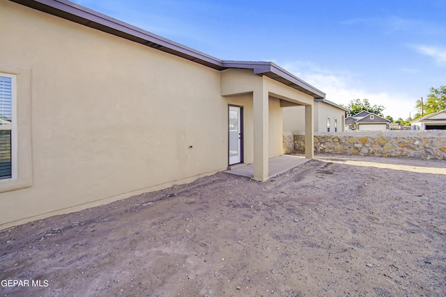 exterior space with a patio