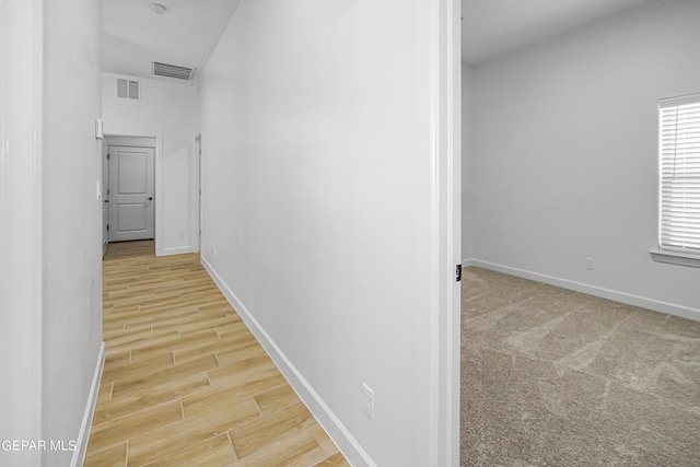 hallway featuring light hardwood / wood-style floors