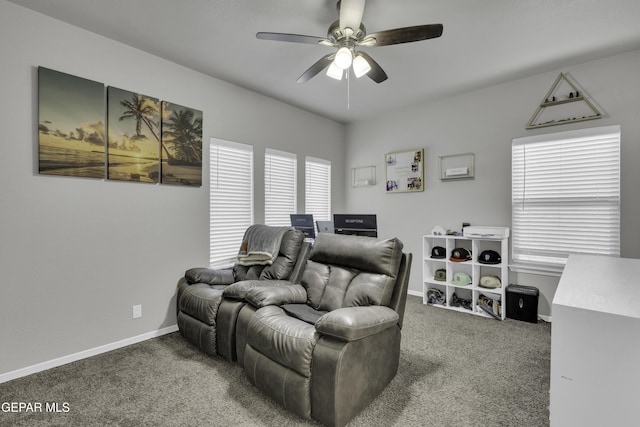 carpeted cinema with ceiling fan