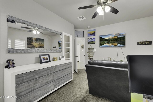 interior space featuring ceiling fan