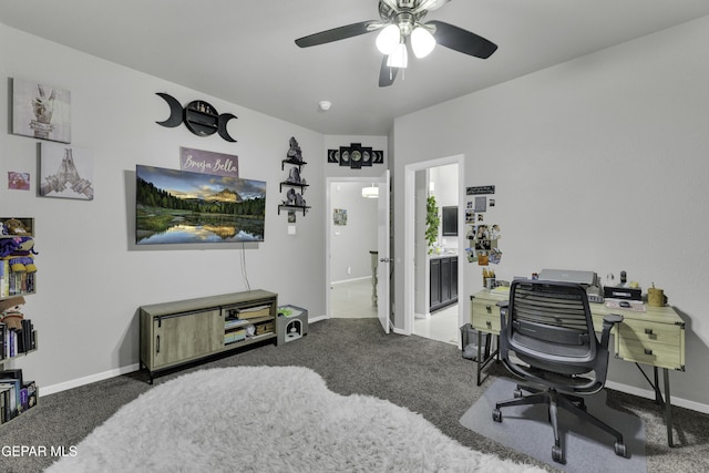 carpeted office with ceiling fan