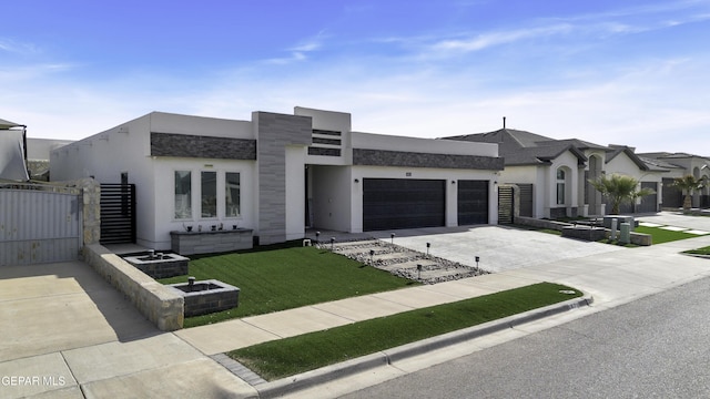 view of front of home with a garage and a front lawn