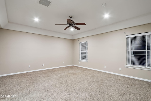 empty room with carpet floors and ceiling fan