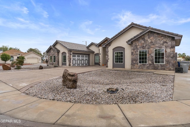 view of front of property featuring a garage