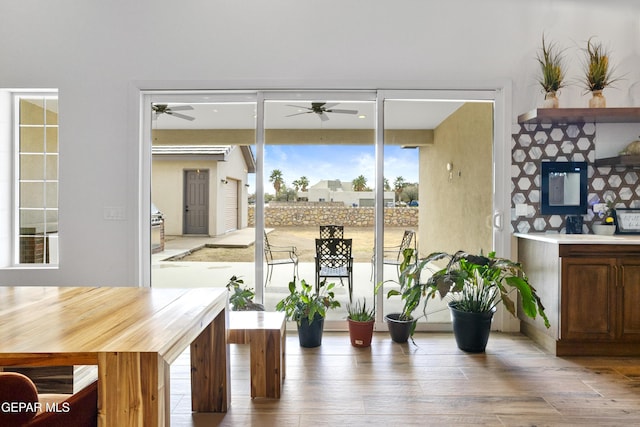 dining space featuring wood-type flooring