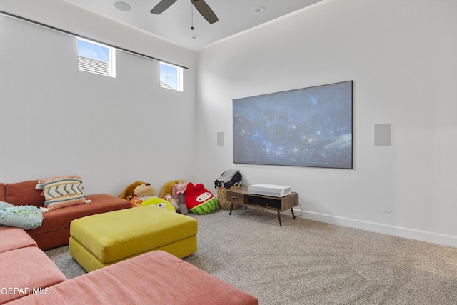 interior space featuring light colored carpet and ceiling fan