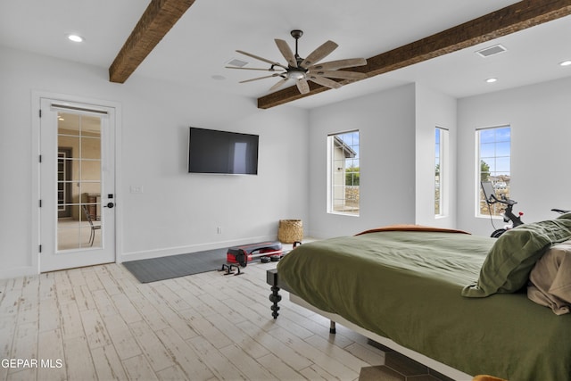 bedroom featuring ceiling fan, light hardwood / wood-style flooring, and beam ceiling