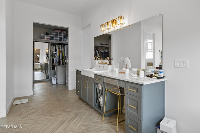 bathroom featuring vanity and parquet floors