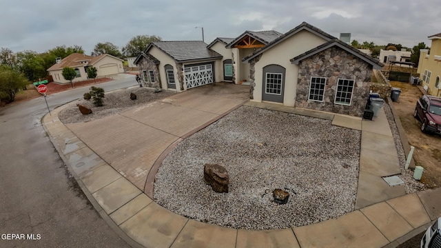 ranch-style home with a garage