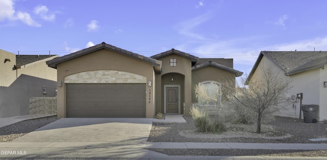 view of front of property with a garage