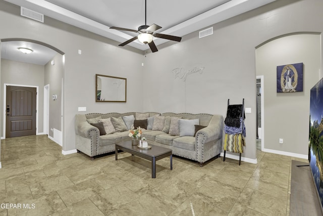 living room with ceiling fan