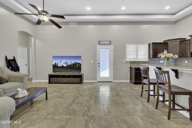 living room with ceiling fan