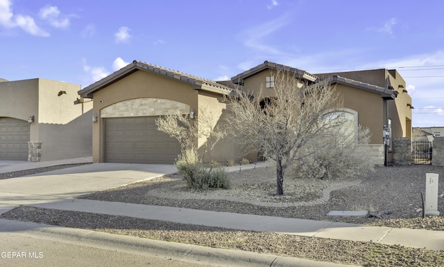 view of front of home with a garage