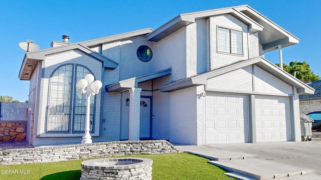 view of front of property with a garage