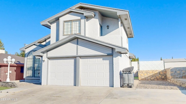 view of front of property featuring a garage