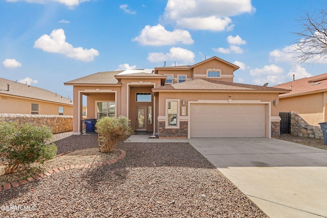 view of front of property with a garage