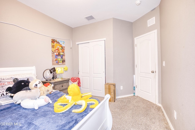 bedroom with carpet floors and a closet