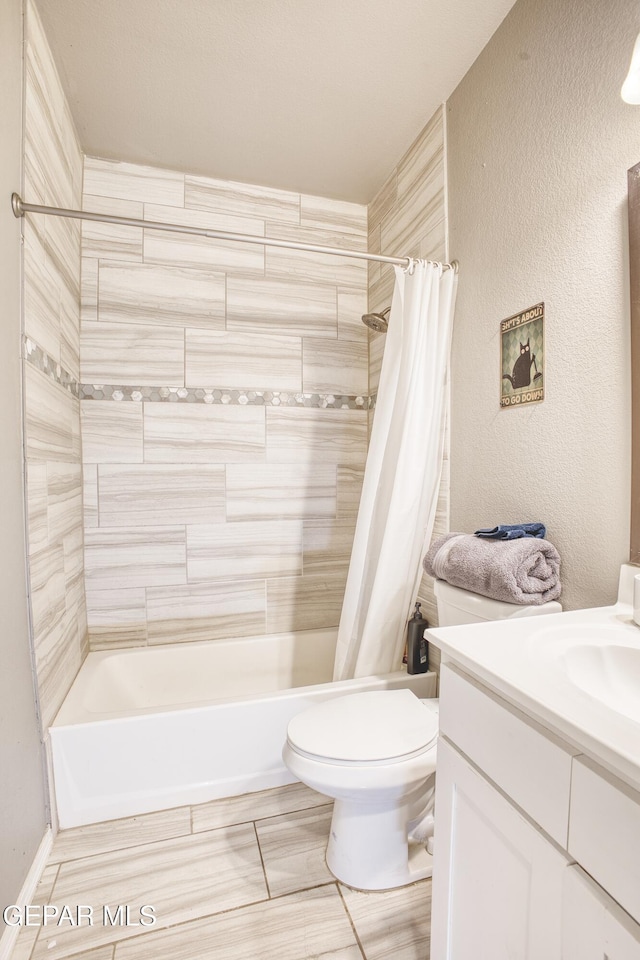 full bathroom with vanity, toilet, and shower / bathtub combination with curtain