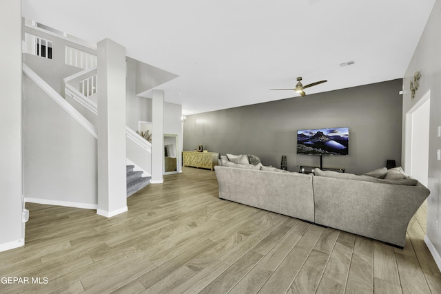 living room with ceiling fan