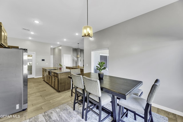 dining area featuring sink