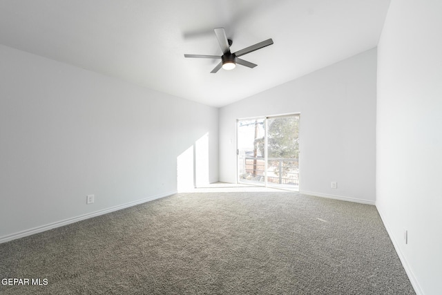 carpeted empty room with ceiling fan and lofted ceiling