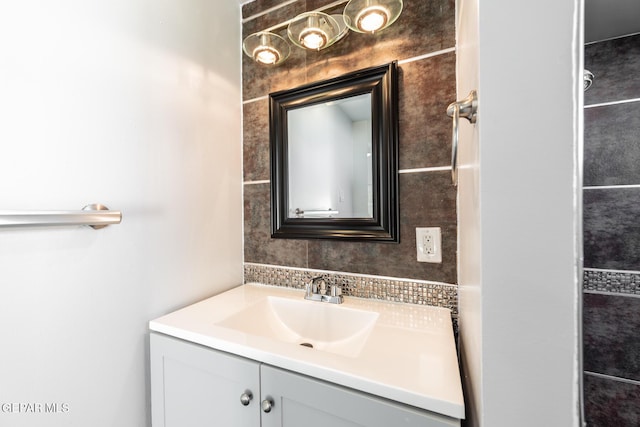 bathroom with backsplash and vanity