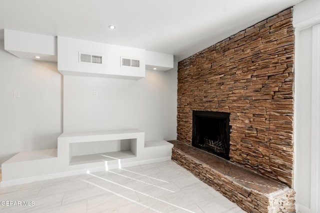 unfurnished living room with a fireplace