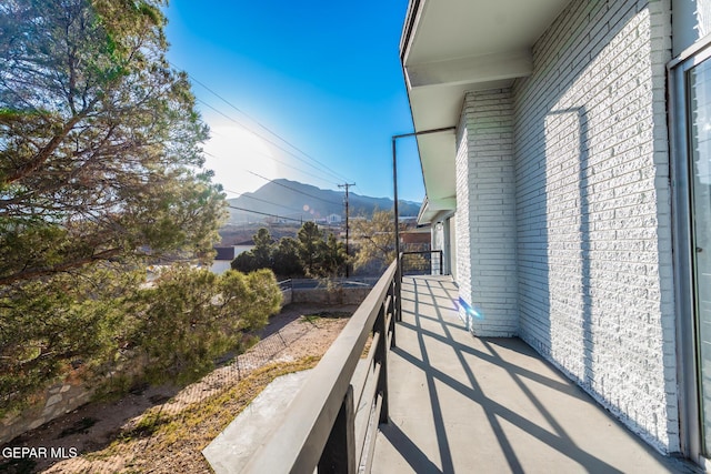 balcony featuring a mountain view