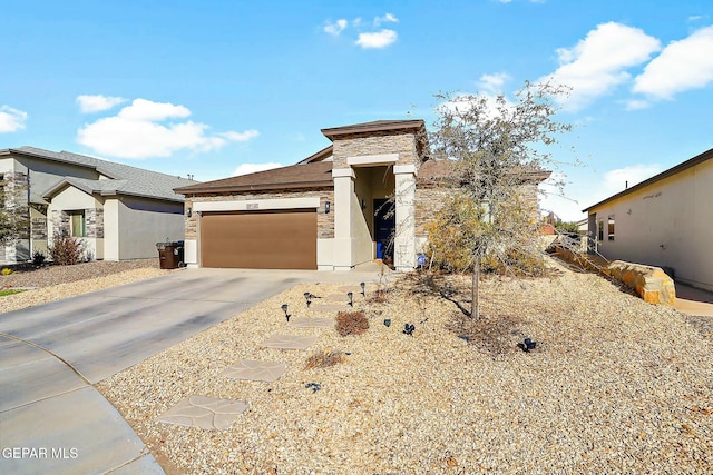 prairie-style house featuring a garage