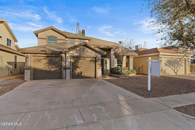 view of front of home featuring a garage