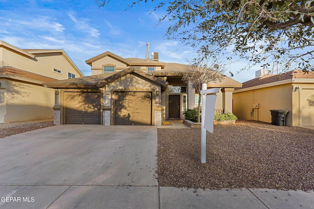 view of front of home with a garage