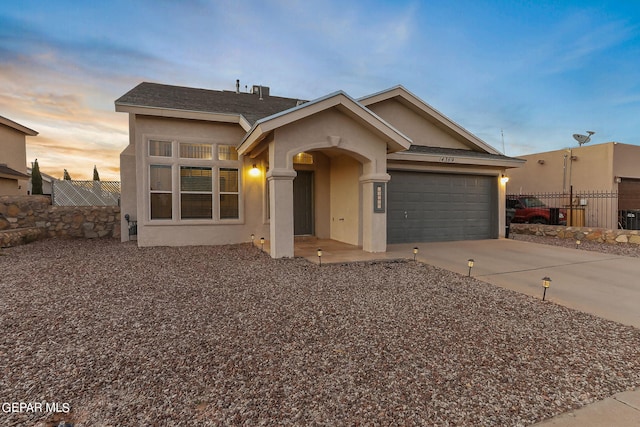 view of front of home with a garage