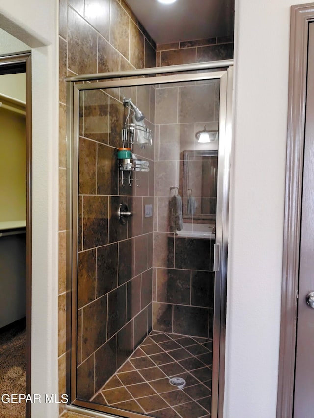 full bathroom featuring a stall shower