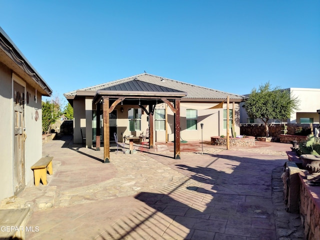 view of patio featuring a gazebo