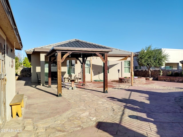 view of patio / terrace featuring a gazebo