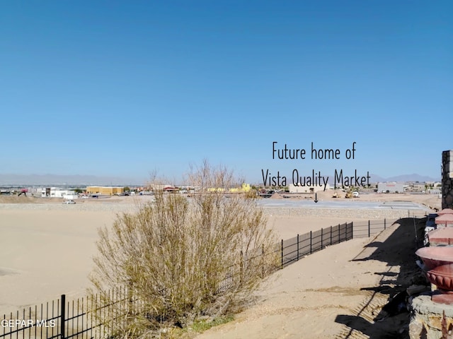 view of water feature featuring fence