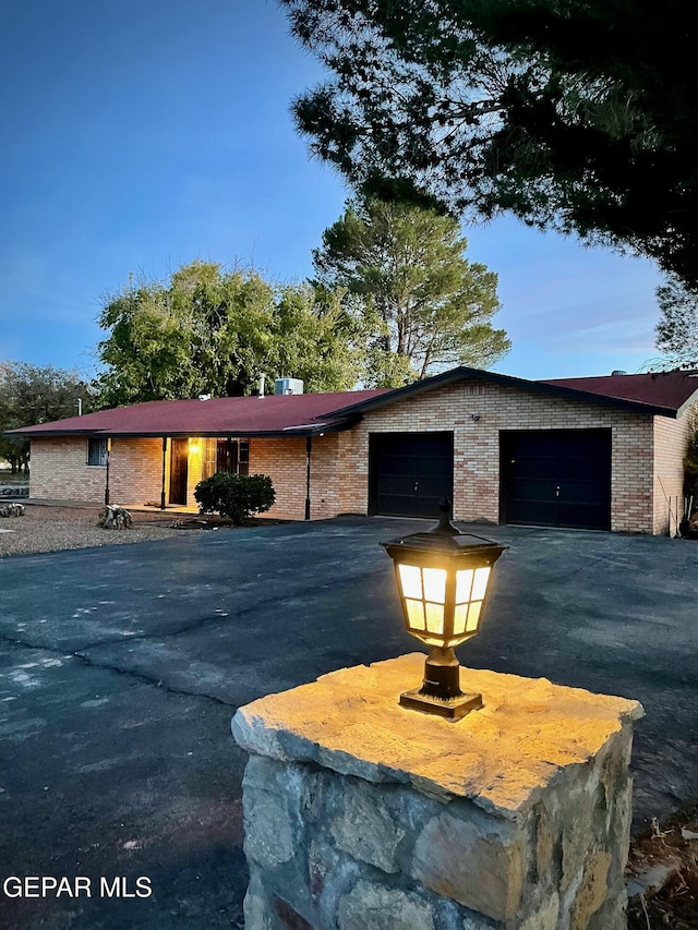 view of front of property featuring a garage