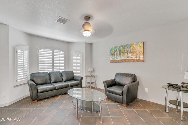 living room featuring tile patterned floors