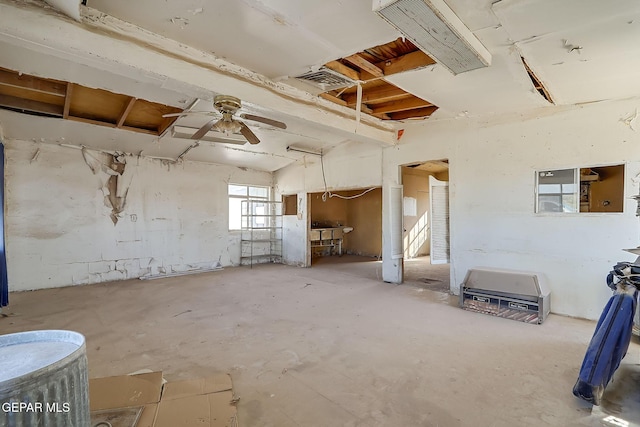 basement featuring ceiling fan