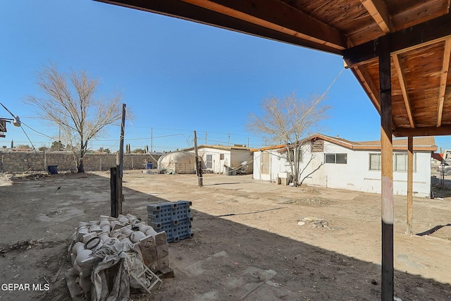 view of yard with a patio and a shed