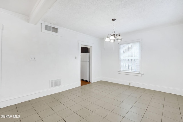 unfurnished room with an inviting chandelier, a textured ceiling, and beam ceiling