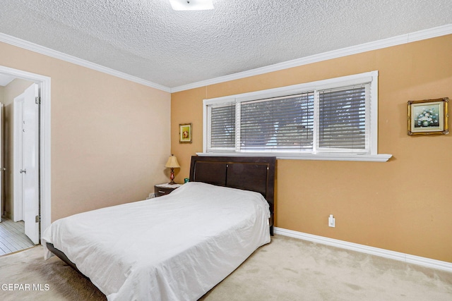 carpeted bedroom with crown molding and a textured ceiling