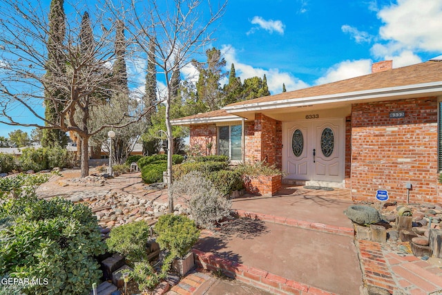 property entrance with a patio