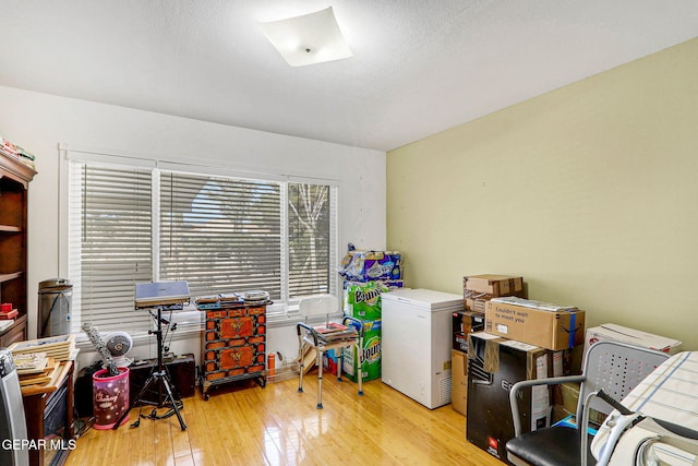 misc room with light hardwood / wood-style floors