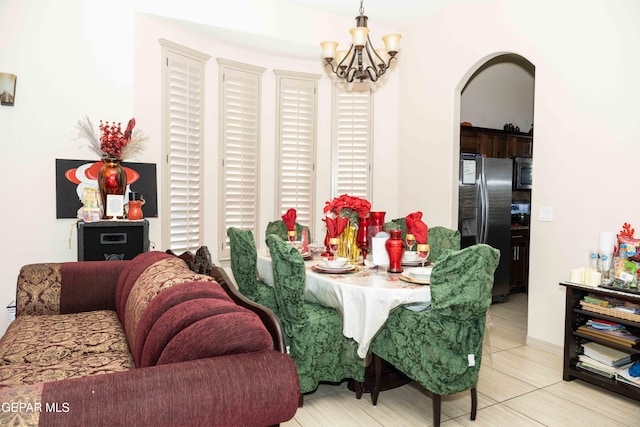 dining room featuring a notable chandelier