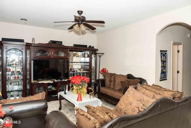 living room featuring ceiling fan