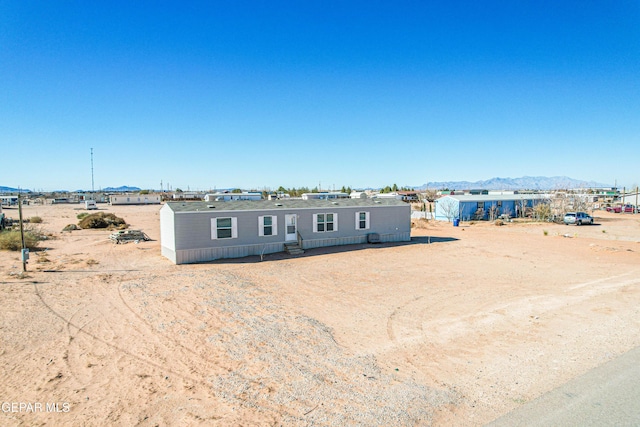 manufactured / mobile home featuring a mountain view